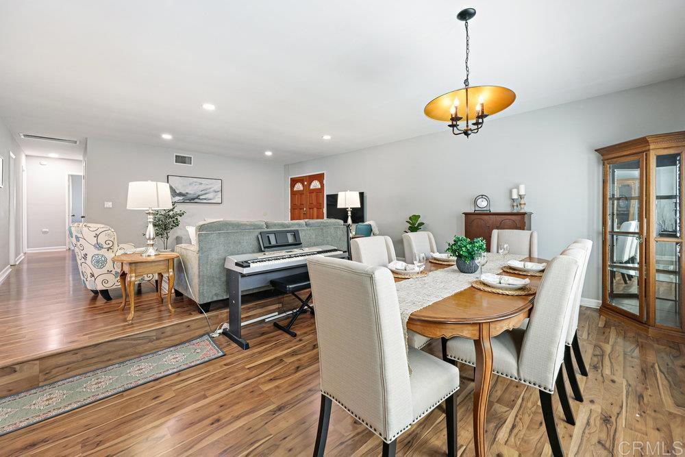 8450 Carlton Oaks Drive Santee, CA 92071 - Photo 8 of 30 a view of a dining room with furniture and wooden floor