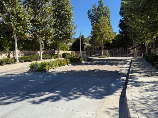 22244 Craft Calabasas, CA 91302 - Photo 2 of 8 a view of a yard with wooden fence