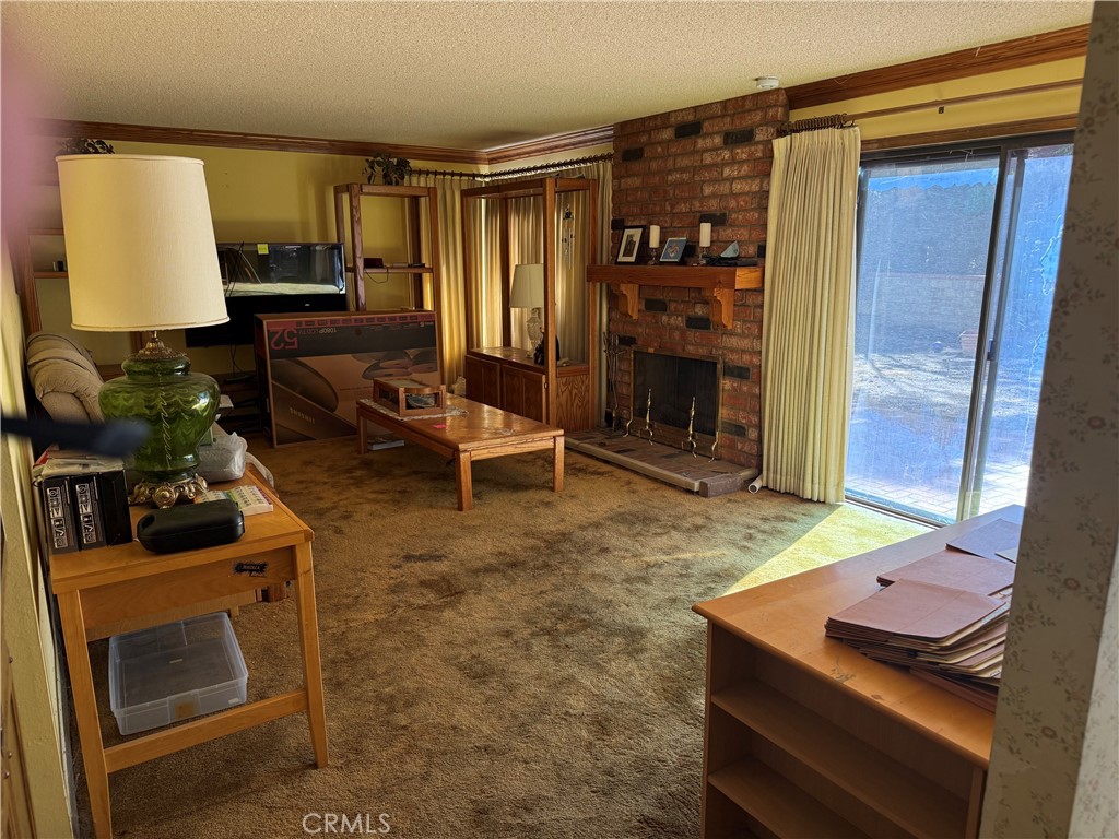 22244 Craft Calabasas, CA 91302 - Photo 4 of 8 a room with furniture and a fireplace