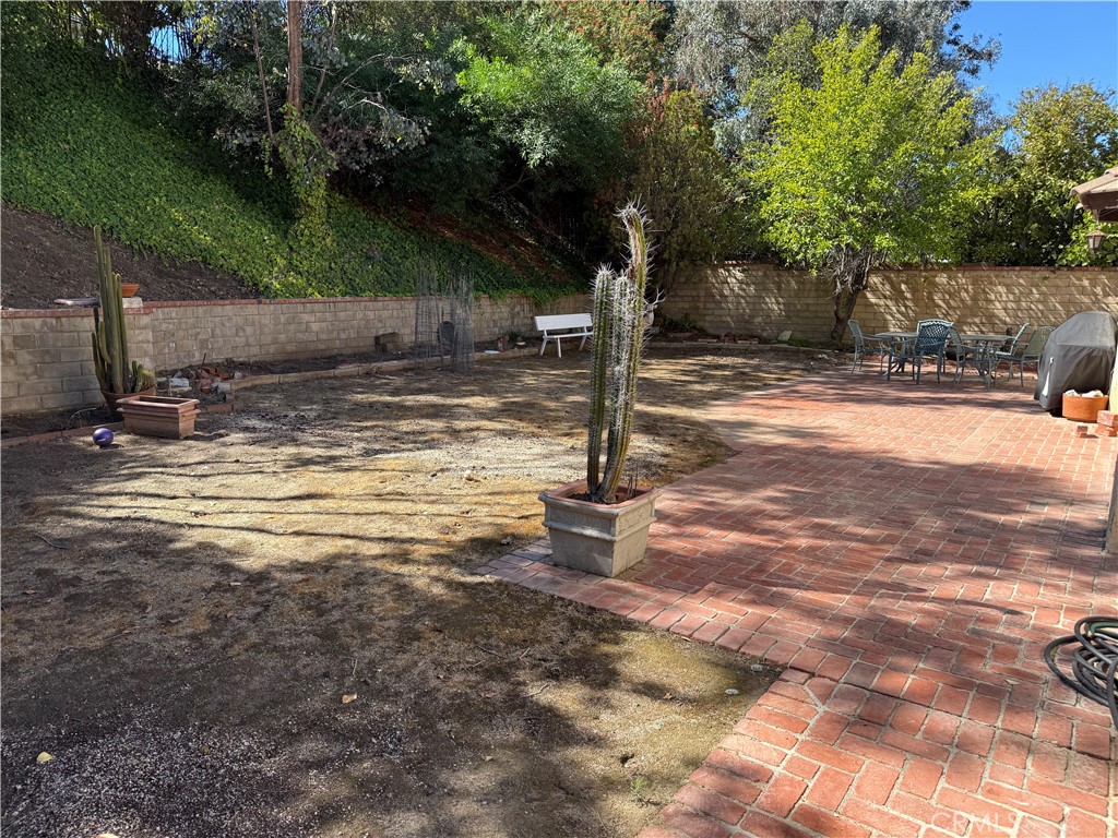 22244 Craft Calabasas, CA 91302 - Photo 5 of 8 a view of a yard with an trees