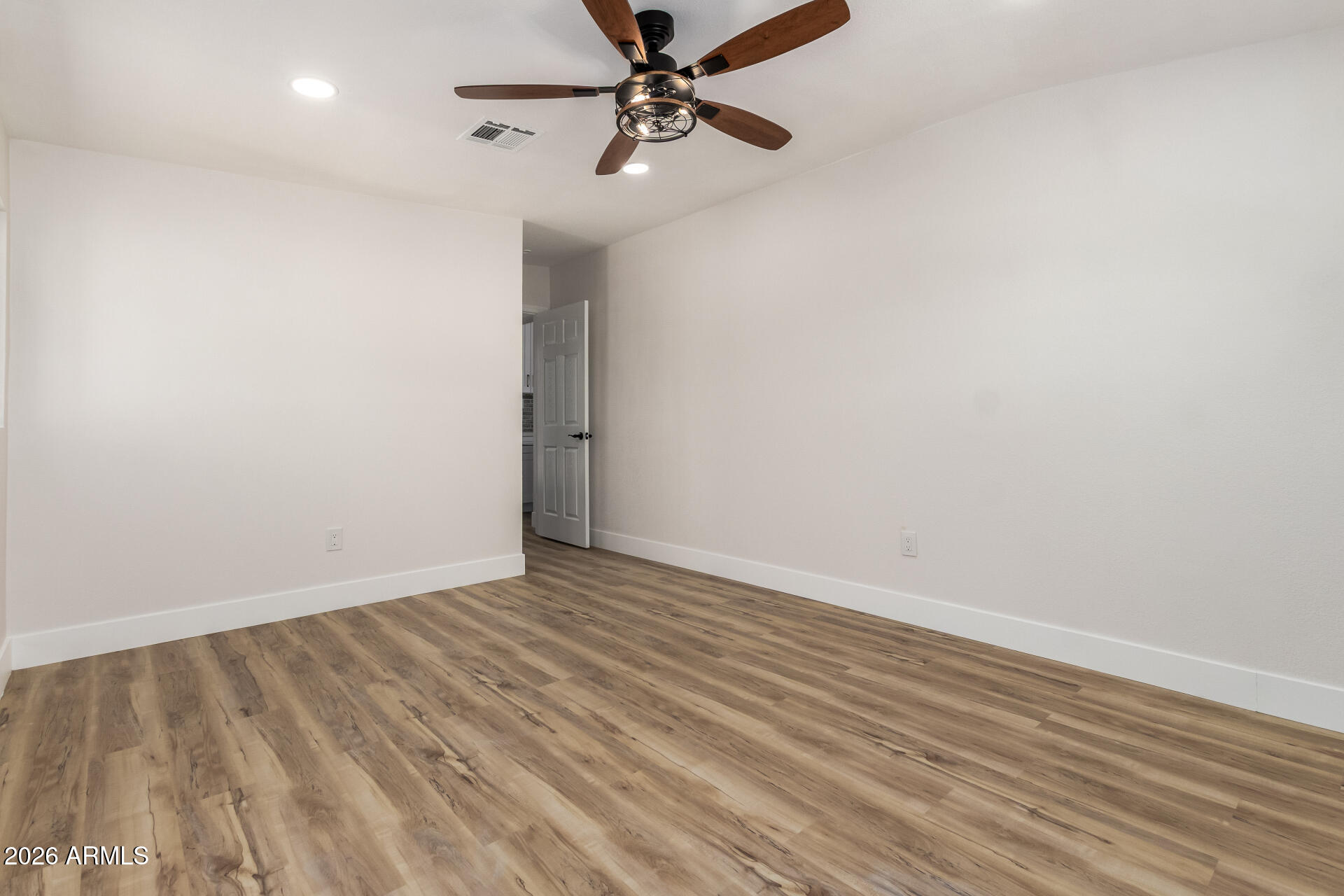 3111 North 34th Street Phoenix, AZ 85018 - Photo 26 of 76 a view of an empty room with a window