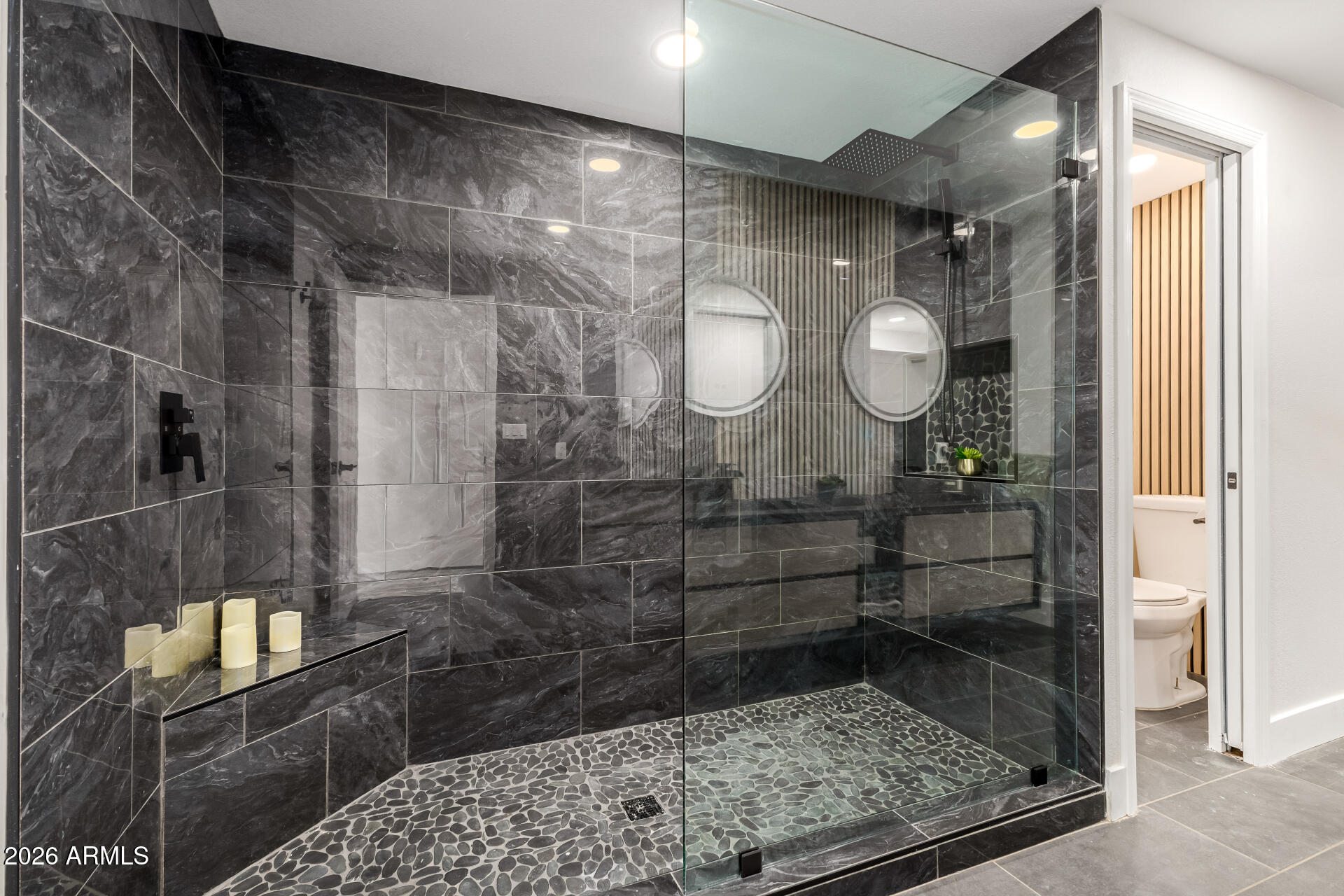 3111 North 34th Street Phoenix, AZ 85018 - Photo 35 of 76 a bathroom with a glass shower door