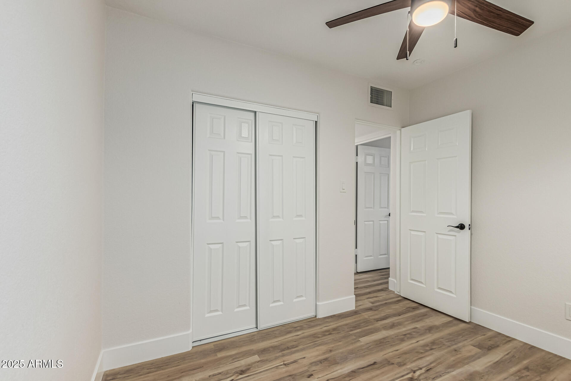3111 North 34th Street Phoenix, AZ 85018 - Photo 56 of 76 wooden floor in an empty room