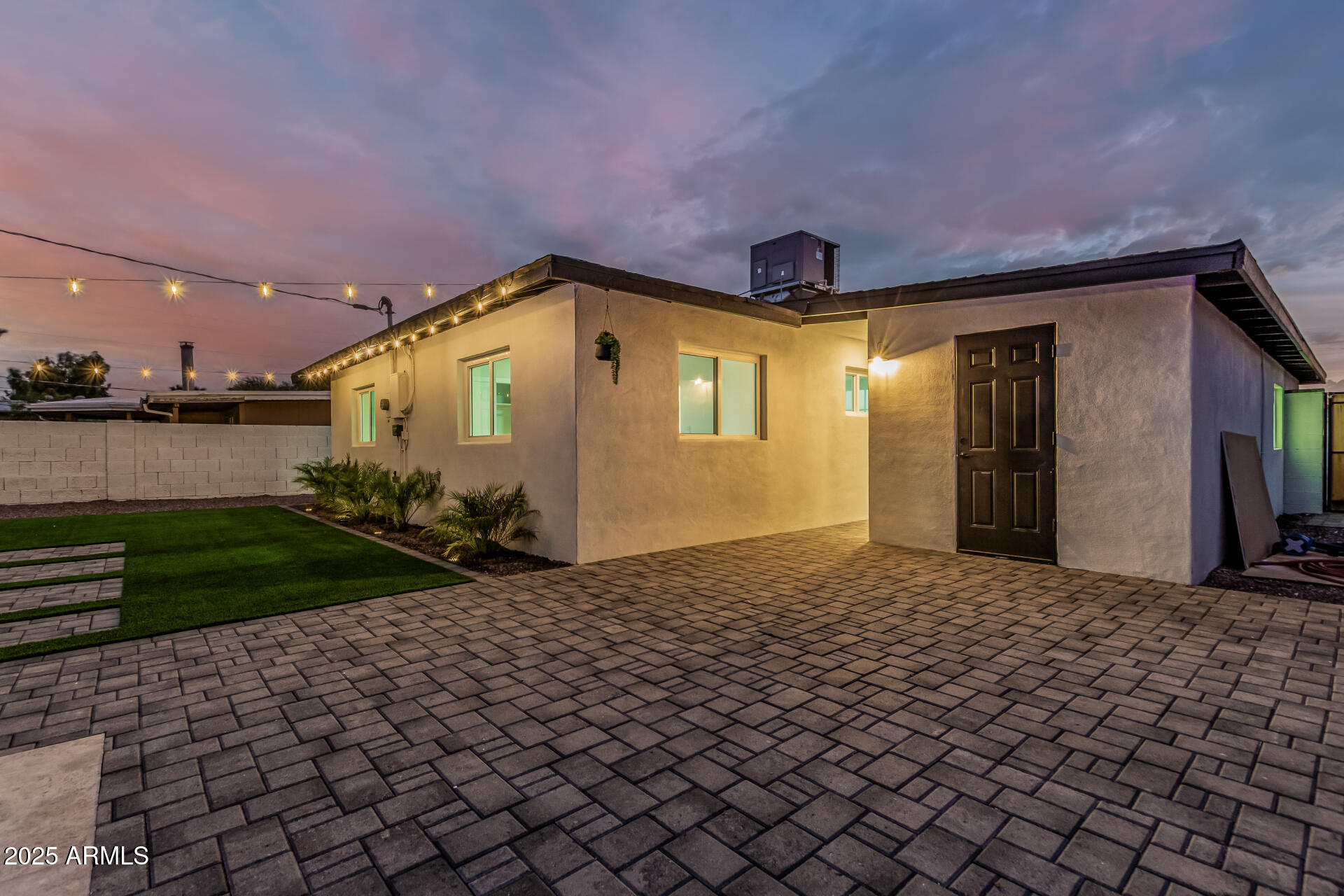 3111 North 34th Street Phoenix, AZ 85018 - Photo 6 of 76 a front view of a house with garden