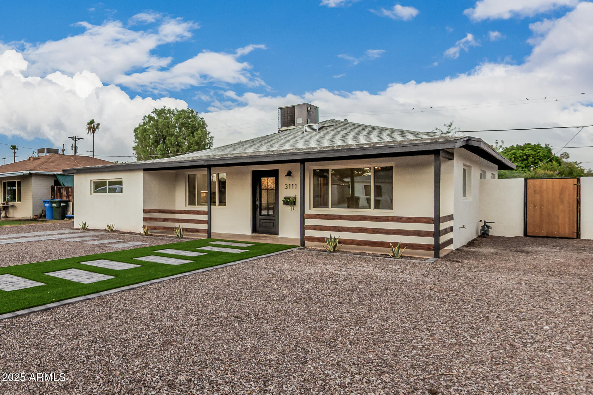 3111 North 34th Street Phoenix, AZ 85018 - Photo 63 of 76 a house view with a backyard space