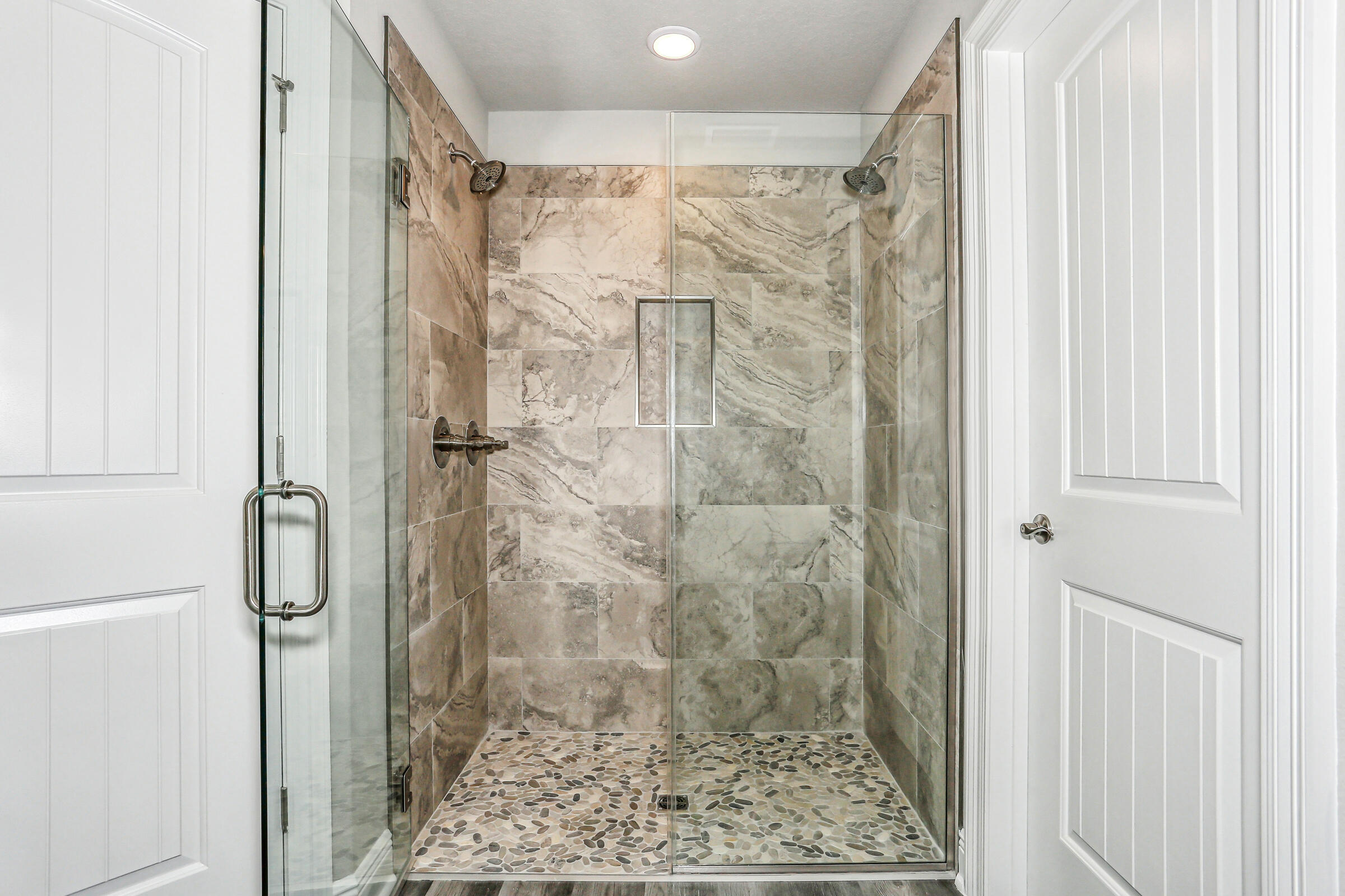 3494 Doyle Hawkins Road Navarre, FL 32566 - Photo 23 of 31 a bathroom with a shower