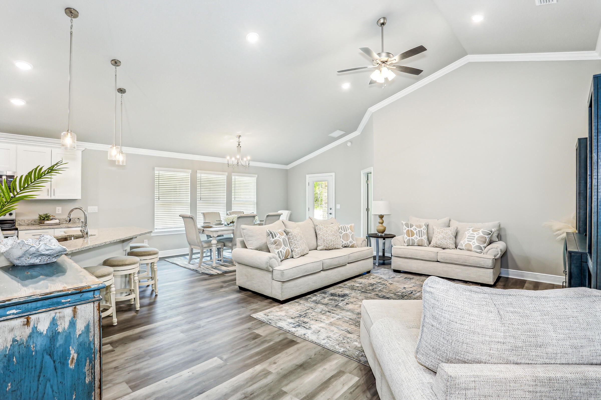 3494 Doyle Hawkins Road Navarre, FL 32566 - Photo 7 of 31 a living room with furniture and a large window
