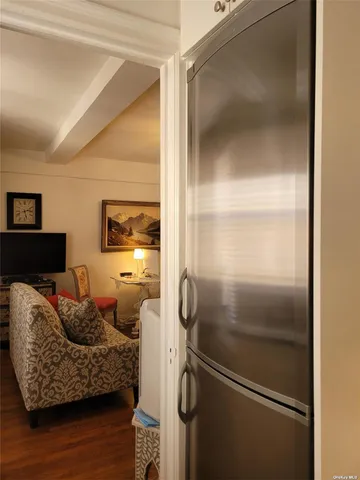 a living room with furniture and a gate