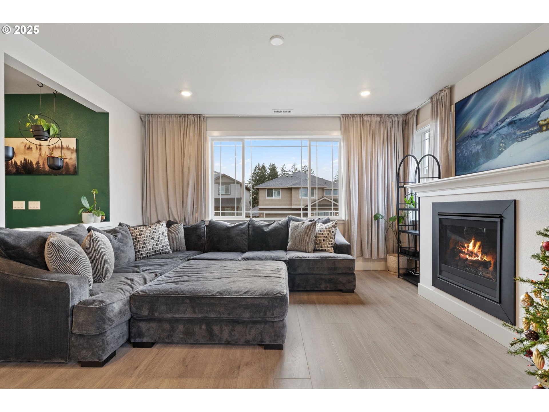 16719 Southwest Beemer Lane Portland, OR 97224 - Photo 12 of 47 a living room with furniture and a fireplace