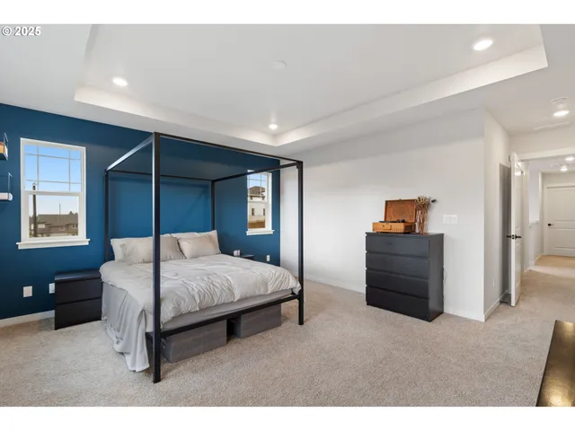 a bedroom with a bed and a closet
