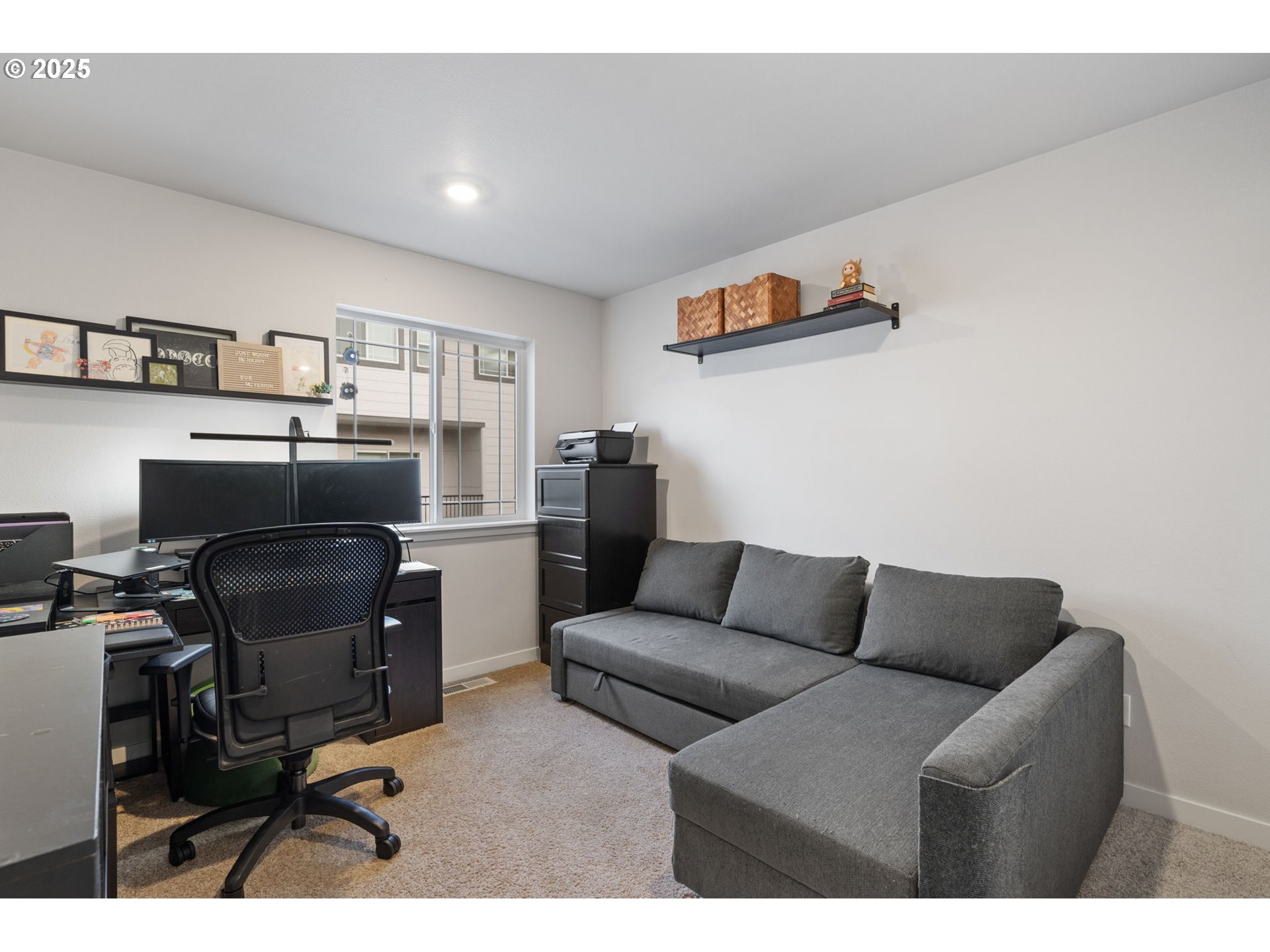 16719 Southwest Beemer Lane Portland, OR 97224 - Photo 30 of 47 a livingroom with workspace and a couch