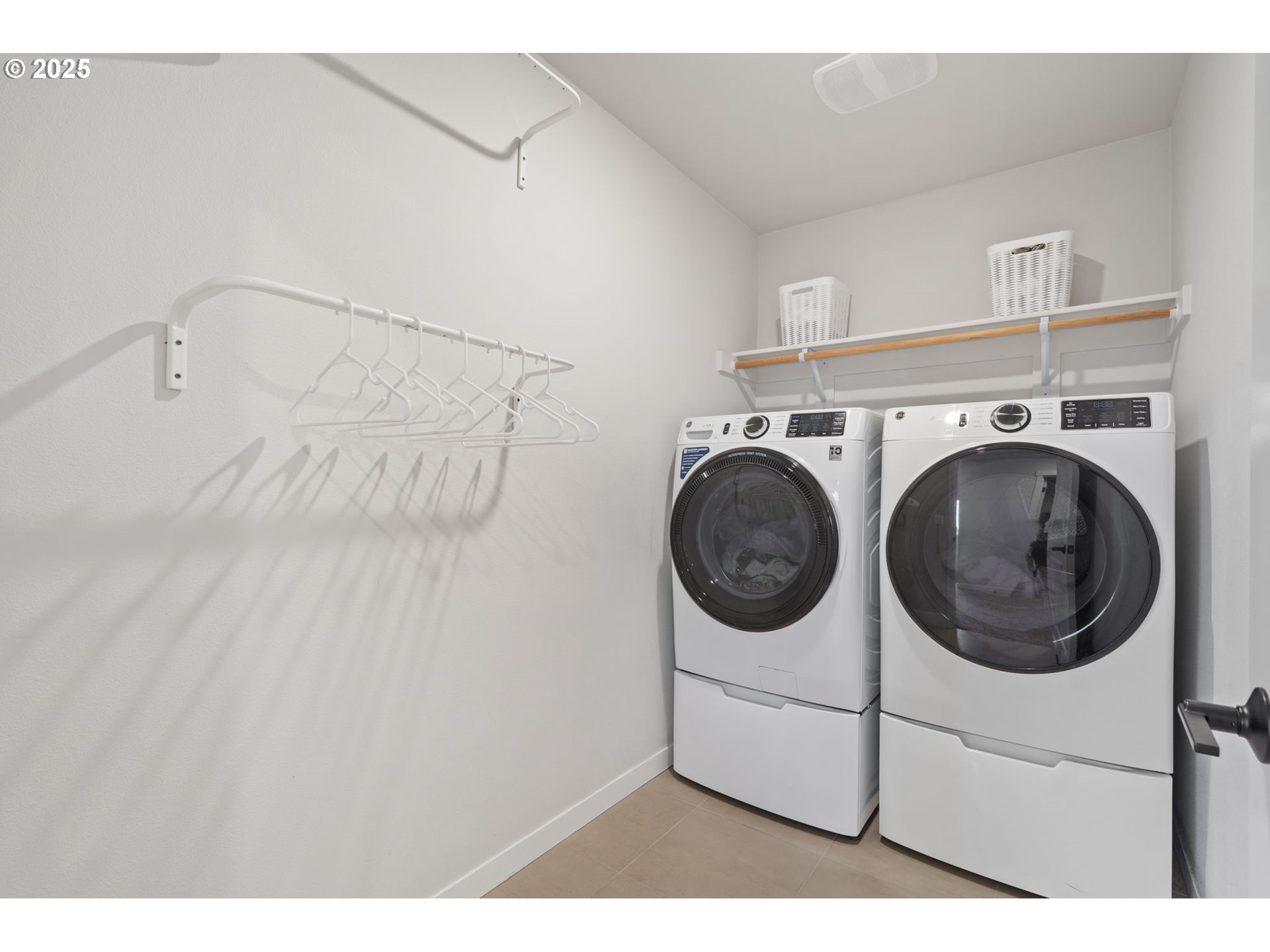 16719 Southwest Beemer Lane Portland, OR 97224 - Photo 33 of 47 a utility room with dryer and washer