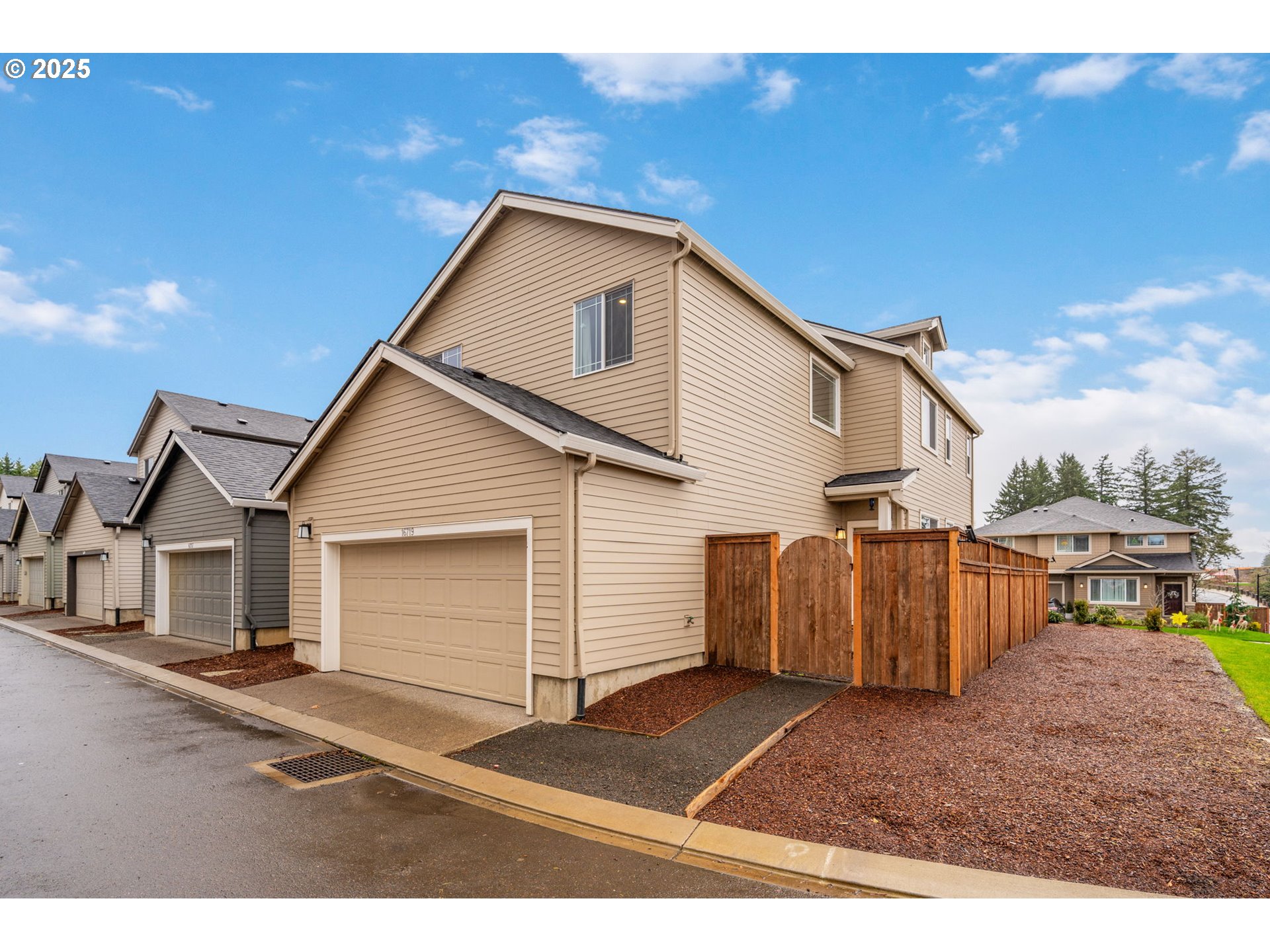 16719 Southwest Beemer Lane Portland, OR 97224 - Photo 38 of 47 a view of a house with backyard