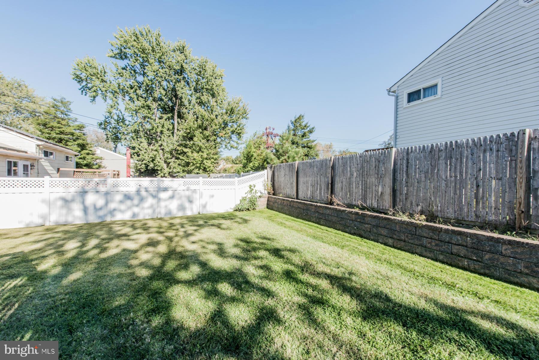 107 Ridgely Road Glen Burnie, MD 21061 - Photo 22 of 22 a backyard of a house