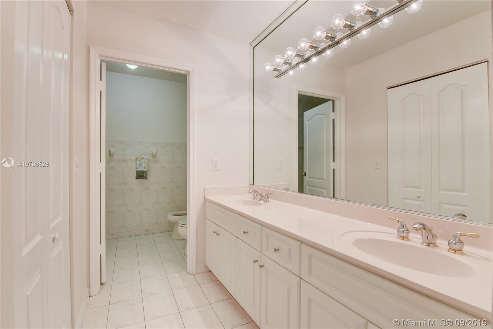 3540 Southwest 13th Street Miami, FL 33145 - Photo 12 of 27 master bathroom. double vanities