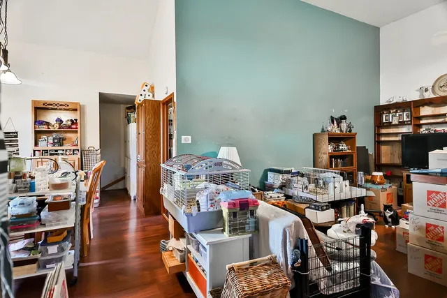 a view of a workspace with furniture and toys