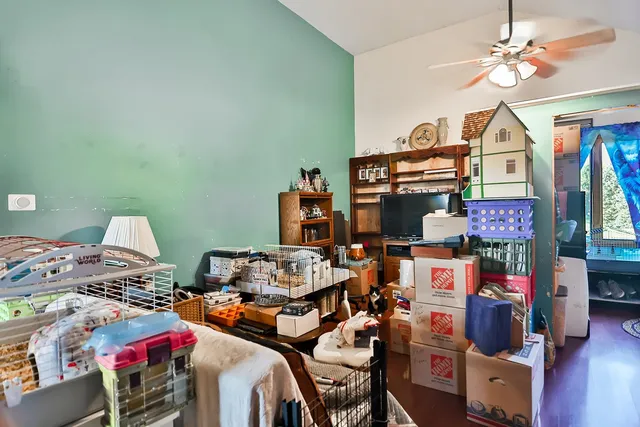 a bedroom with furniture and a chandelier