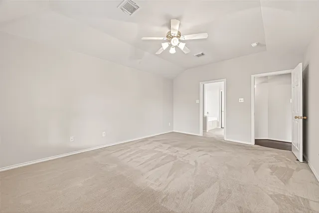 a bathroom with a tub sink and a mirror