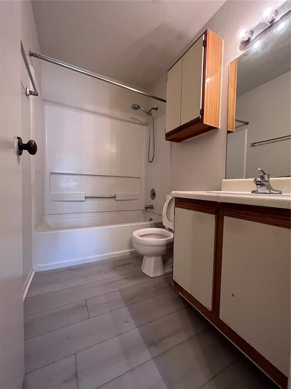 623 Dory Lane, Unit 210 Altamonte Springs, FL 32714 - Photo 9 of 12 a bathroom with a sink a toilet and shower