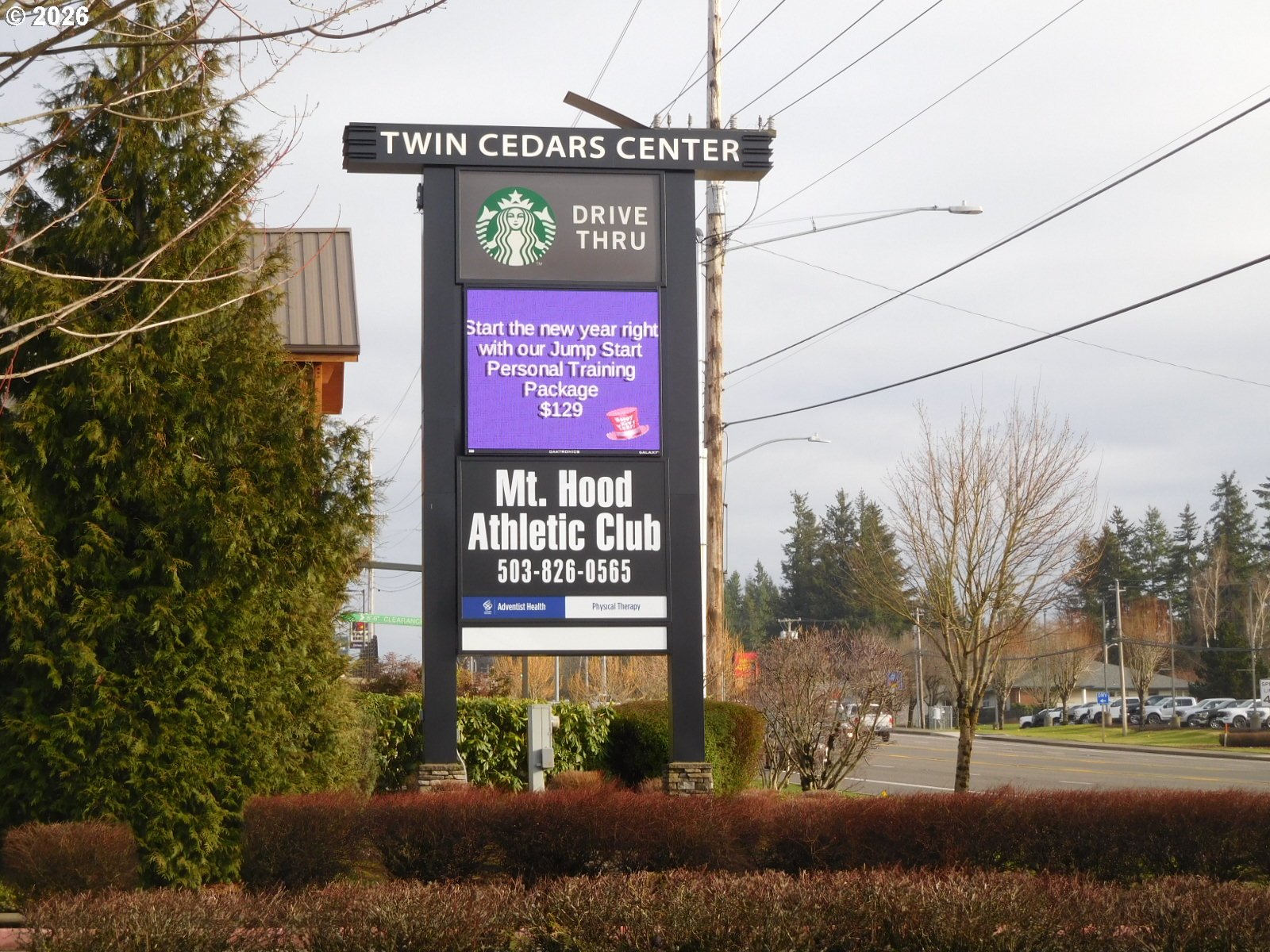 37115 Highway 26 Sandy, OR 97055 - Photo 4 of 6 a sign on the side of a street