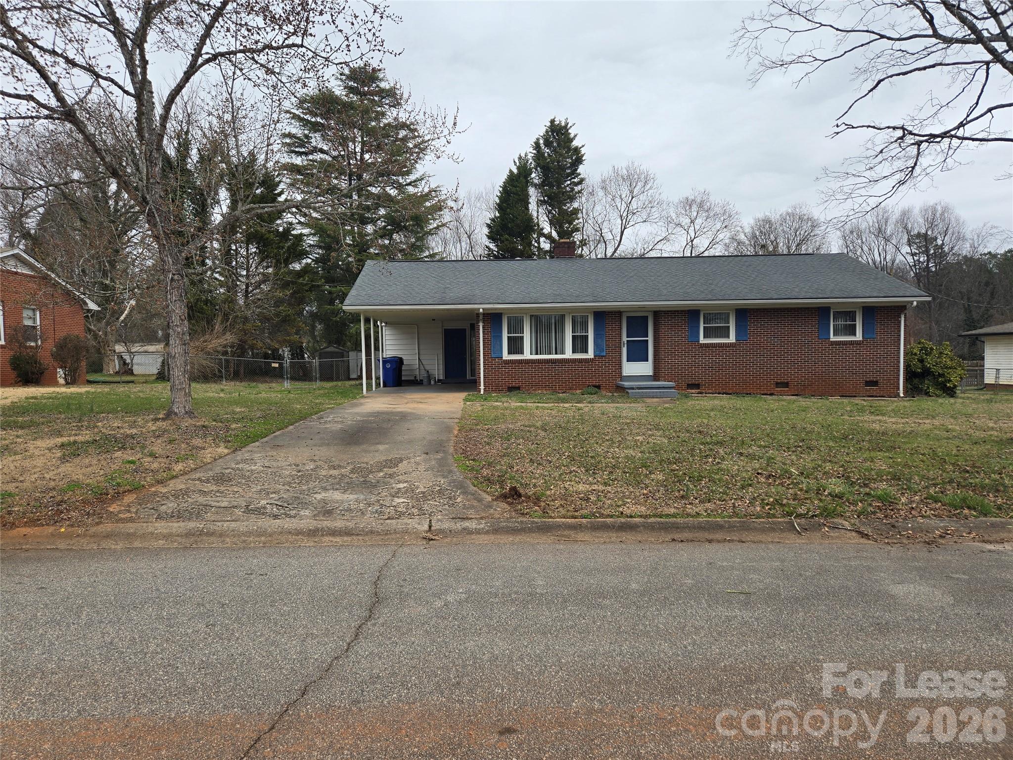 158 Crestview Street Rutherfordton, NC 28139 - Photo 1 of 15 front view of house with a yard