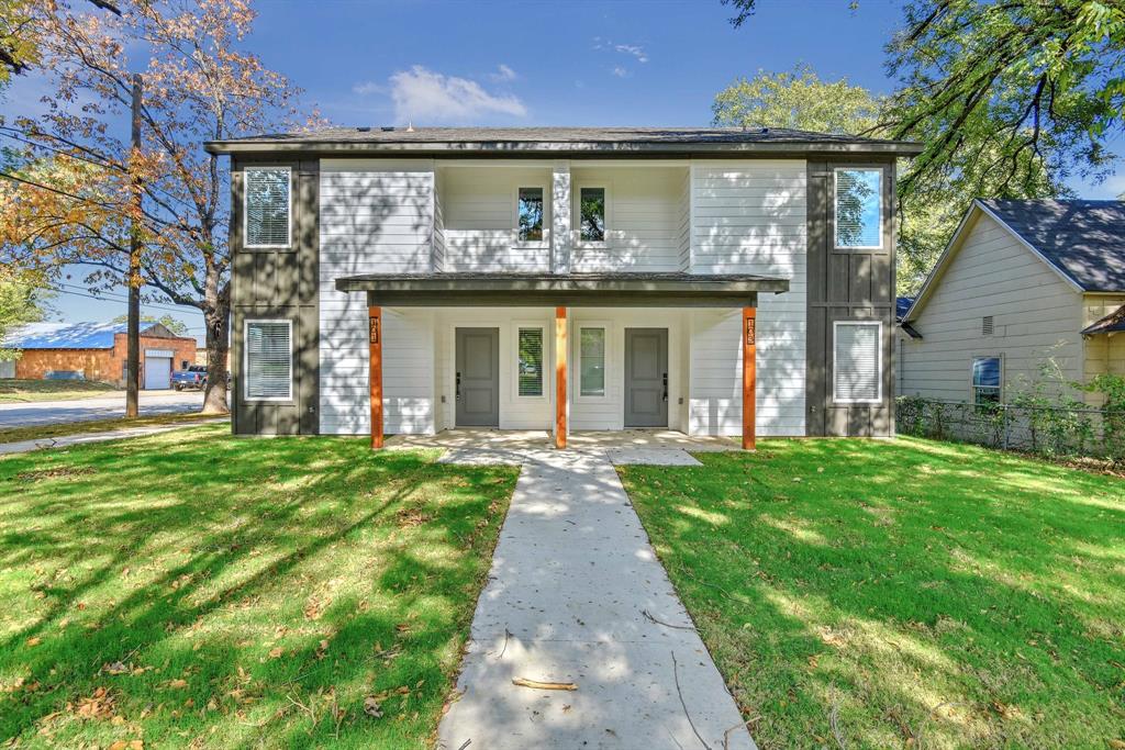 103 East Bond Street Denison, TX 75021 - Photo 1 of 21 a front view of a house with garden
