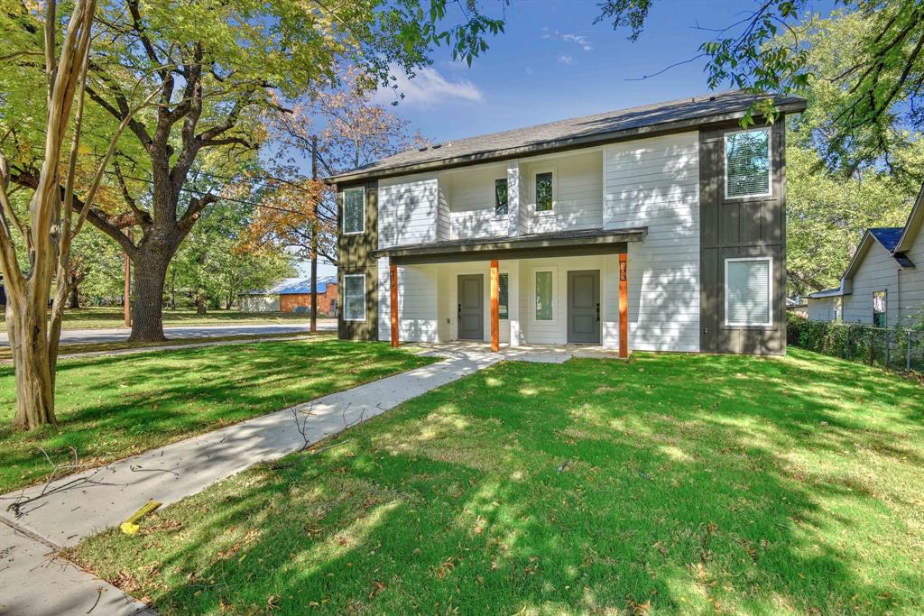103 East Bond Street Denison, TX 75021 - Photo 2 of 21 front view of a house with a yard