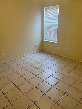 a view of a utility room with a door