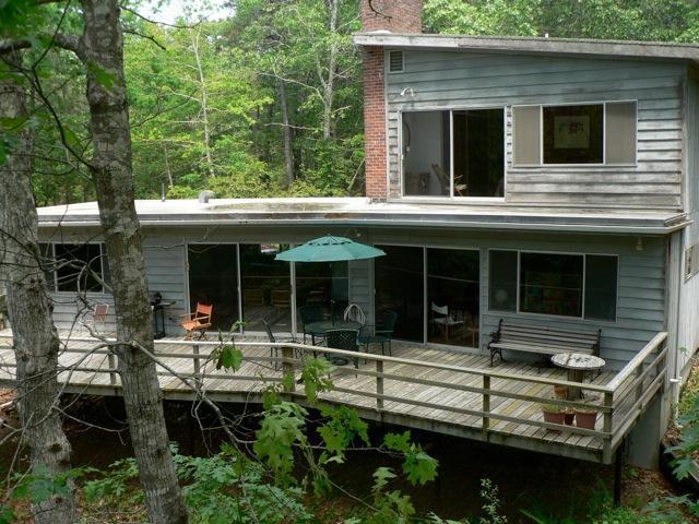 120 Way Wellfleet, MA 02667 - Photo 2 of 10 a front view of a house with garden and porch