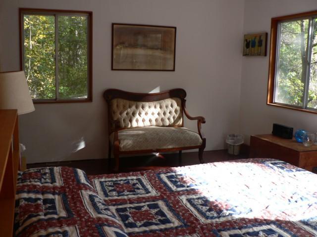 120 Way Wellfleet, MA 02667 - Photo 6 of 10 a bedroom with a bed and wooden floor