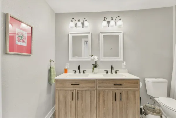 a bathroom with a sink and a toilet