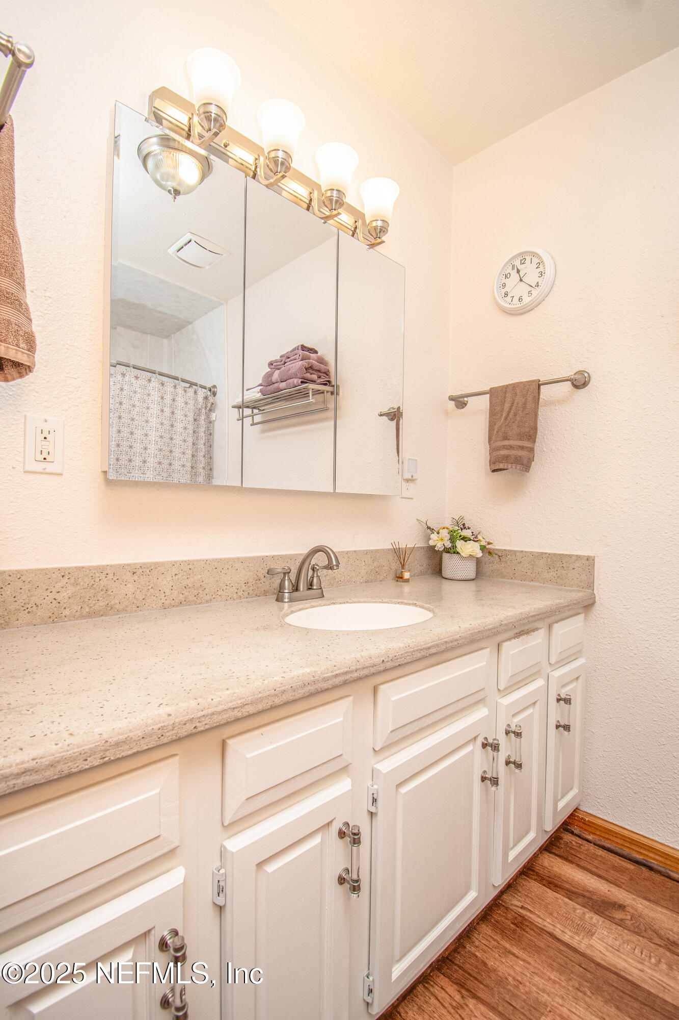 6485 Ray Phillips Road Macclenny, FL 32063 - Photo 23 of 27 a bathroom with a sink and a mirror