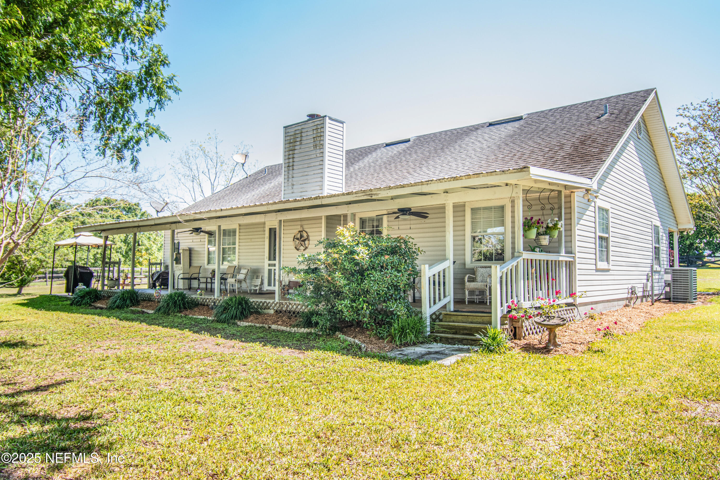 6485 Ray Phillips Road Macclenny, FL 32063 - Photo 6 of 27 a front view of a house with a yard