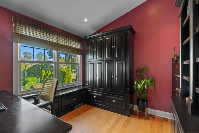 a room with furniture and a potted plant