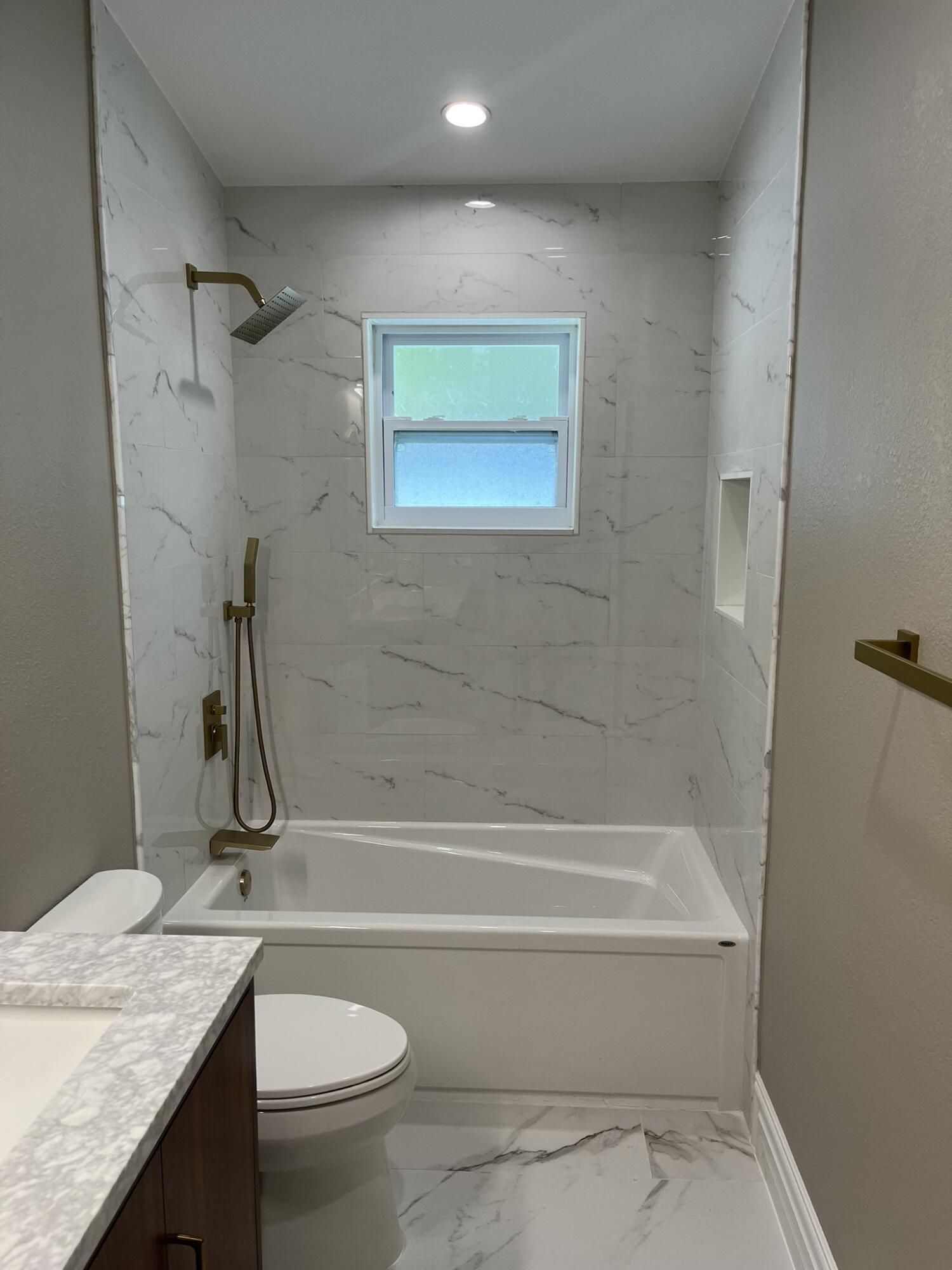 32 Bonefish Avenue Key Largo, FL 33037 - Photo 20 of 34 a bathroom with a granite countertop sink toilet and a mirror