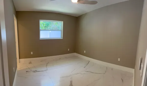 an empty room with windows