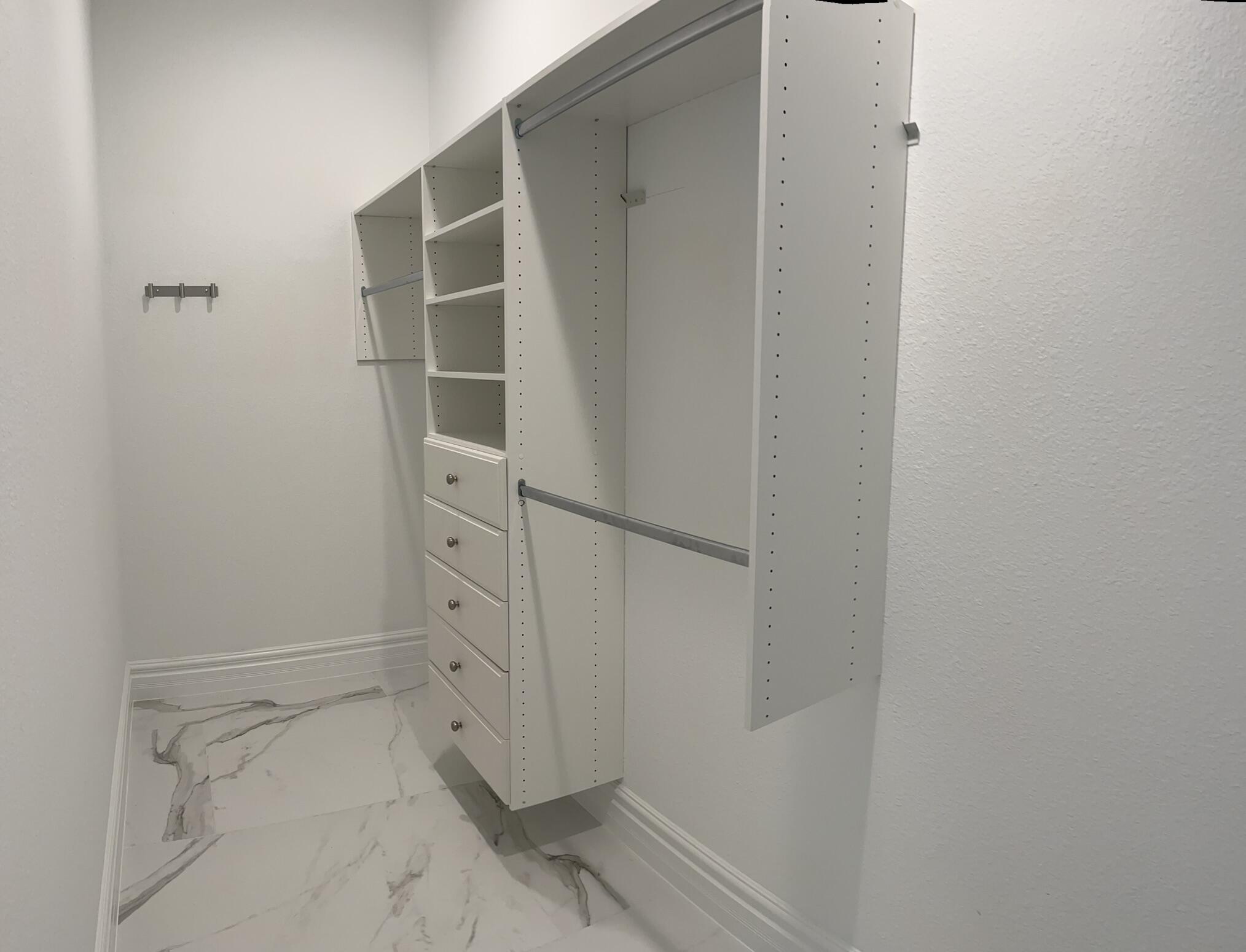 32 Bonefish Avenue Key Largo, FL 33037 - Photo 26 of 34 a view of an empty walk in closet