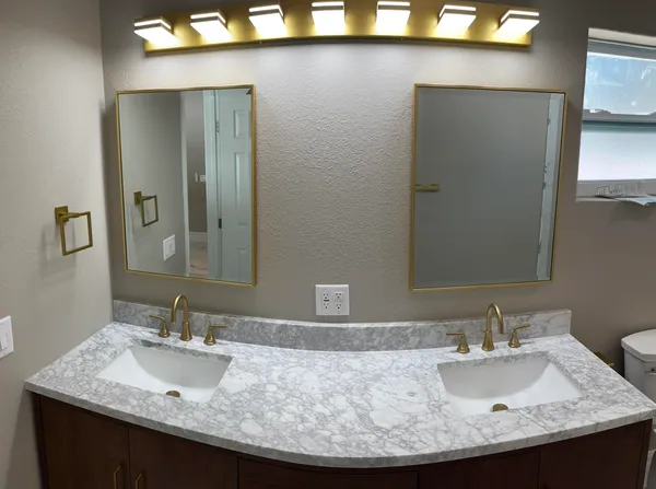 en empty room with windows and closet