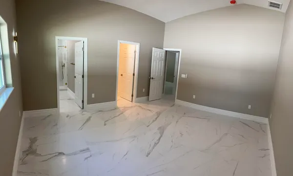 a black and white photo of a living room