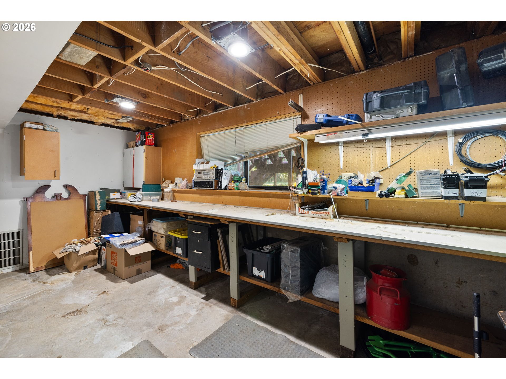 18489 South Ferguson Road Oregon City, OR 97045 - Photo 22 of 39 a room with stainless steel appliances kitchen island granite countertop lots of clutter