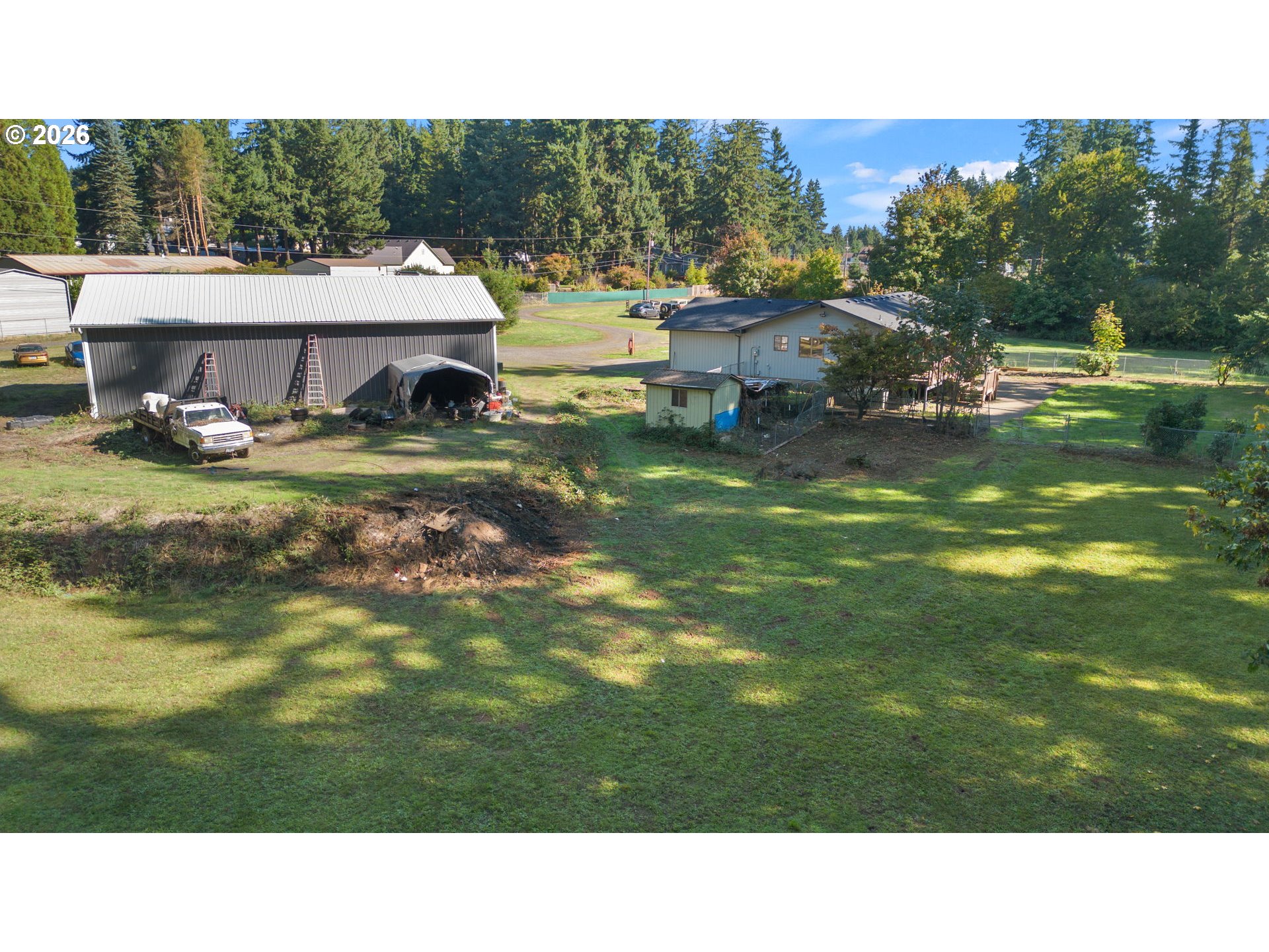 18489 South Ferguson Road Oregon City, OR 97045 - Photo 28 of 39 a view of a house with a yard