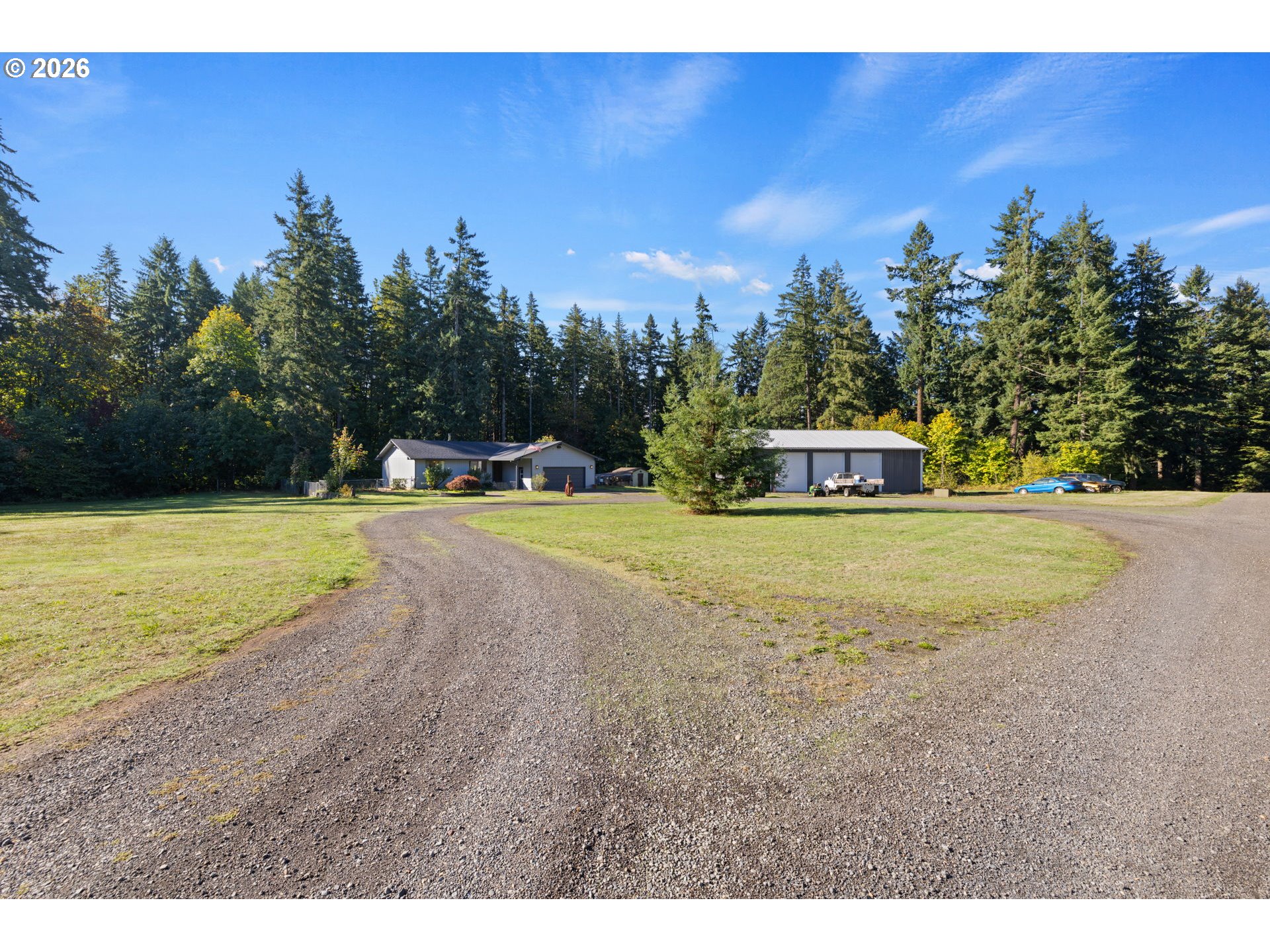 18489 South Ferguson Road Oregon City, OR 97045 - Photo 5 of 39 a view of a house with swimming pool and a yard