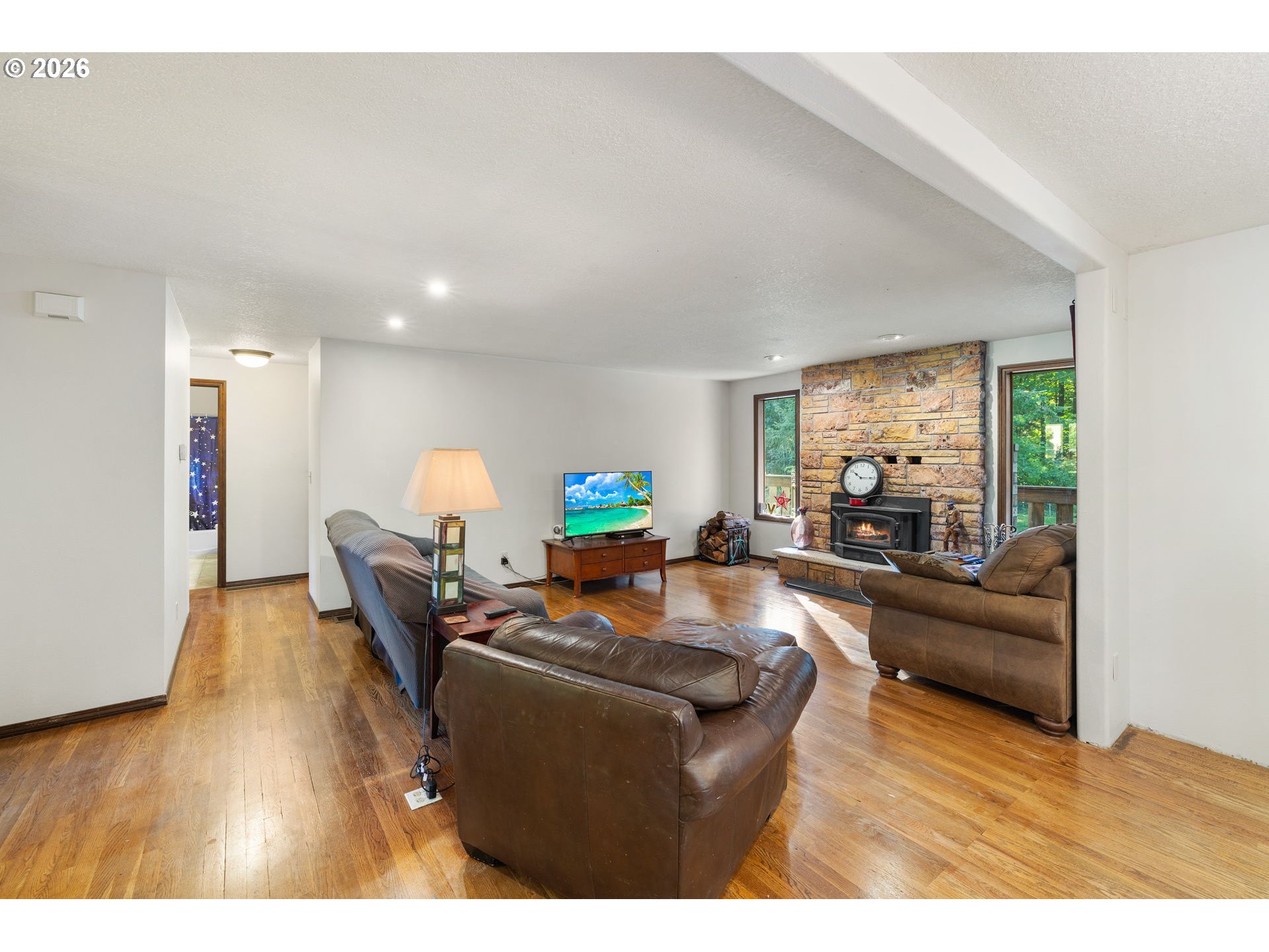 18489 South Ferguson Road Oregon City, OR 97045 - Photo 7 of 39 a living room with furniture and a wooden floor