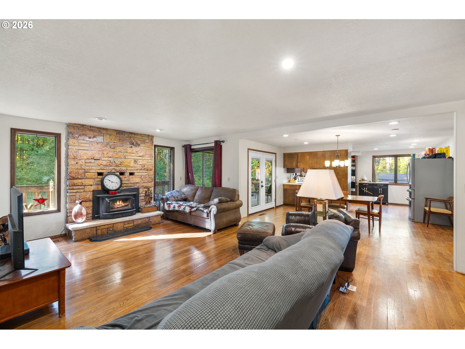 18489 South Ferguson Road Oregon City, OR 97045 - Photo 10 of 39 a living room with furniture and a flat screen tv