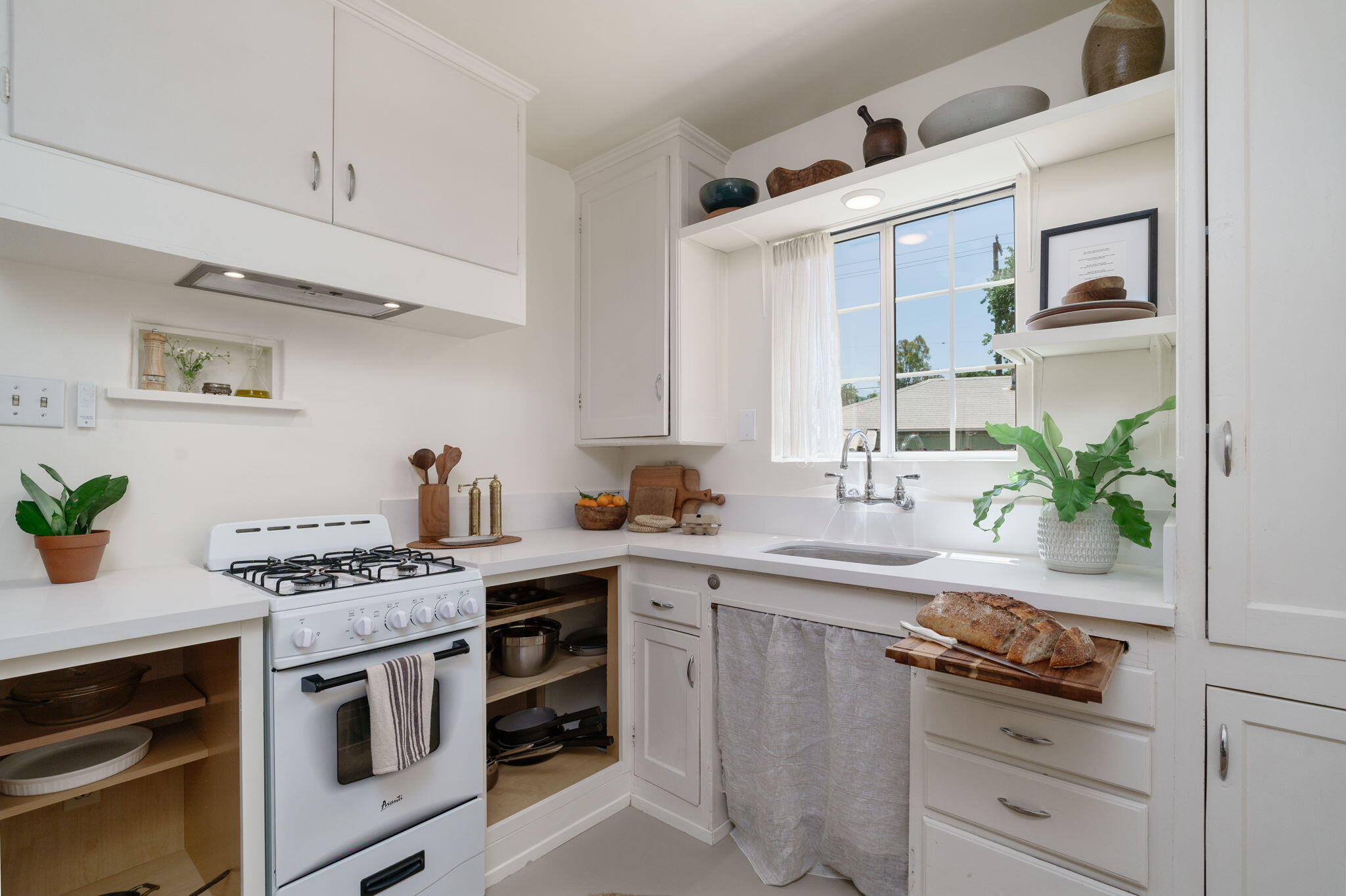 314 West Aliso Street, Unit A Ojai, CA 93023 - Photo 13 of 29 a kitchen with stainless steel appliances granite countertop white cabinets and stove