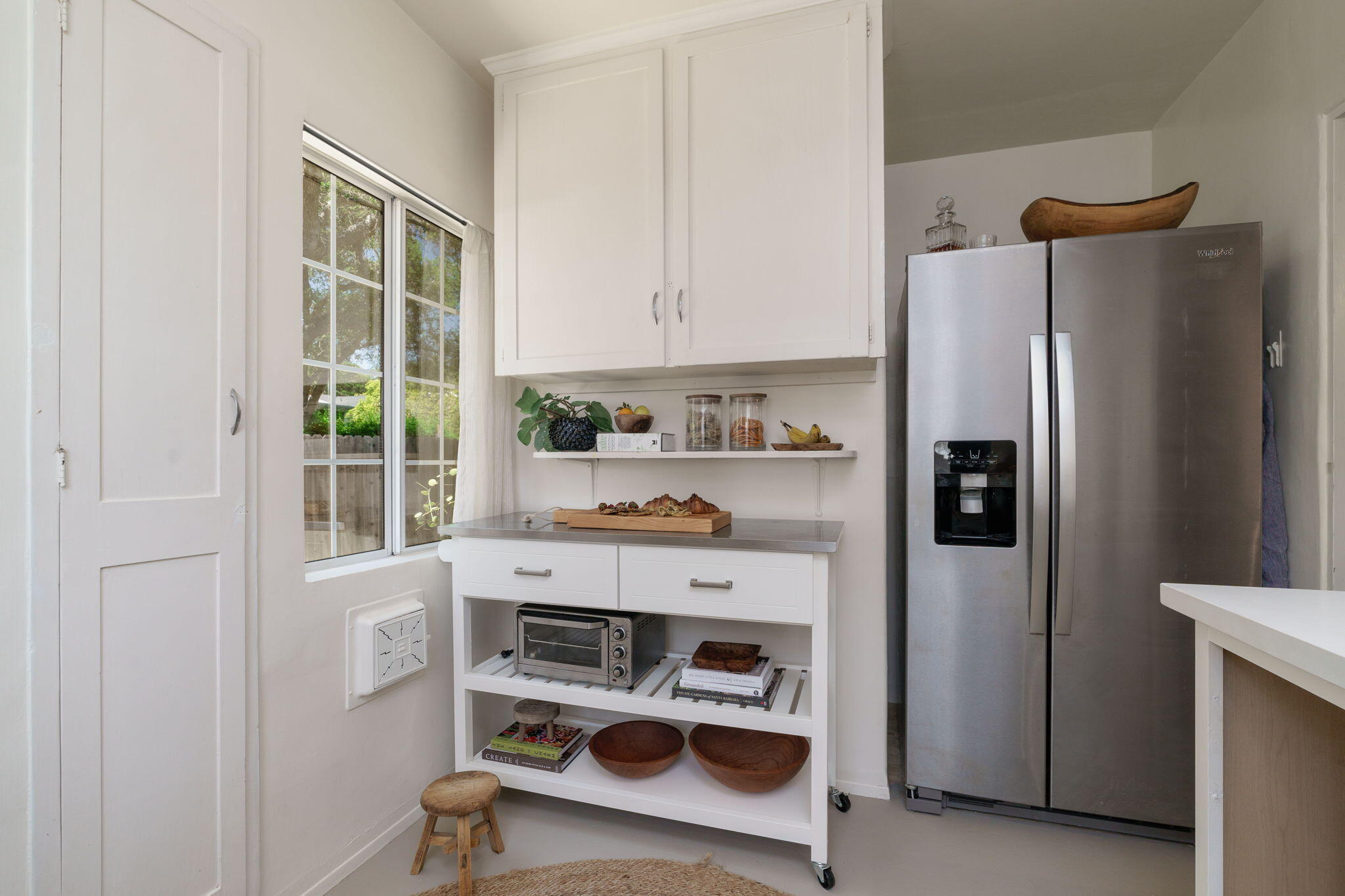 314 West Aliso Street, Unit A Ojai, CA 93023 - Photo 14 of 29 a kitchen with stainless steel appliances a stove a refrigerator and cabinets