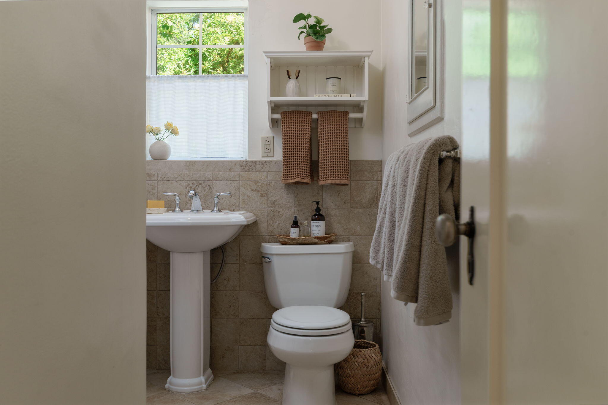 314 West Aliso Street, Unit A Ojai, CA 93023 - Photo 17 of 29 a bathroom with a sink toilet and a mirror
