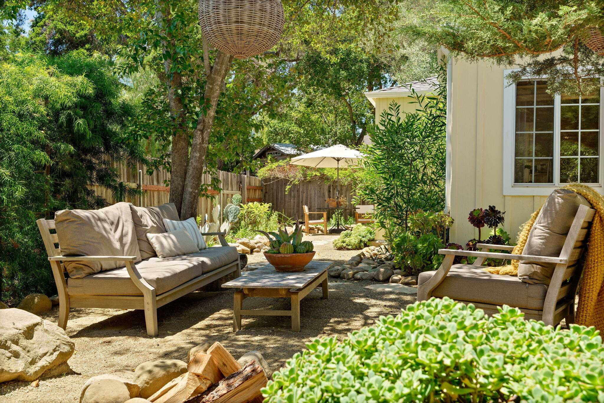 314 West Aliso Street, Unit A Ojai, CA 93023 - Photo 5 of 29 a view of a patio with couches table and chairs and potted plants