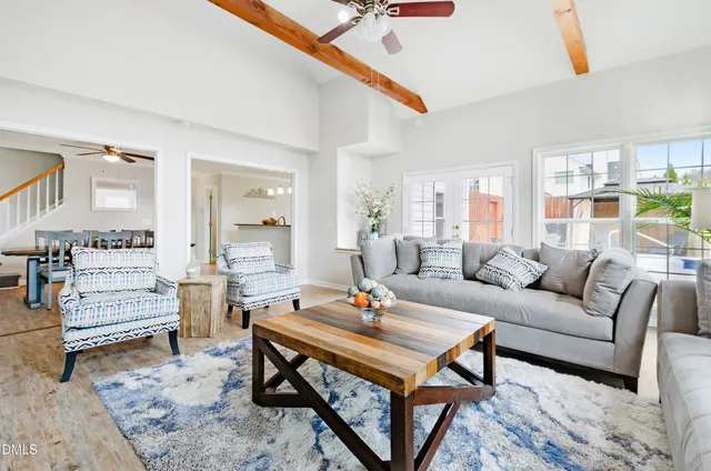 a living room with furniture and a table