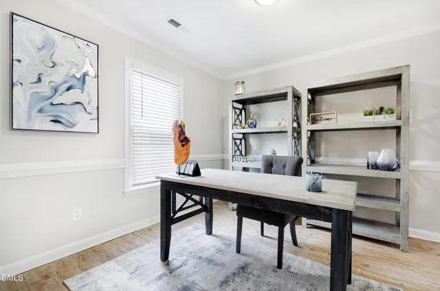 a view of a workspace with furniture